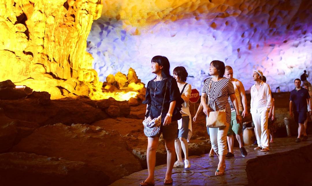 Tourists visiting Hang Trong and Hang Trinh Nu