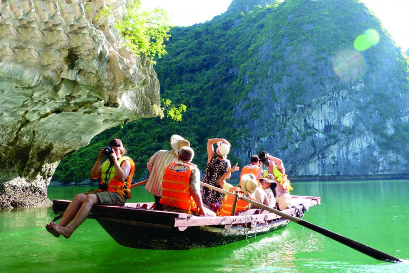 Exploring small caves in Ha Long Bay